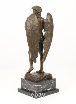 Sculpture of the Winged David in bronze on a marble pedestal after Michelangelo