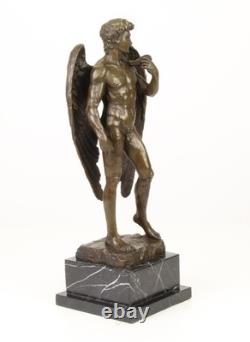 Sculpture of the Winged David in bronze on a marble pedestal after Michelangelo
