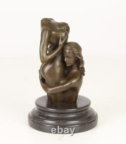 Sculpture of two women in bronze on a black marble base after Nick