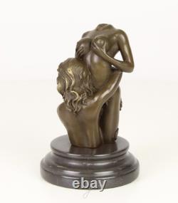 Sculpture of two women in bronze on a black marble base after Nick