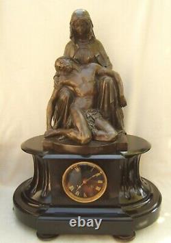Translation: 
Antique marble bronze clock signed JAMES PRADIER statue 1790-1852 Pieta