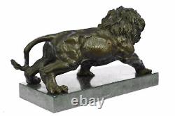 Translation: 'Roaring Angry Lion Signed Barye Cast Bronze Marble Sculpture Statue Figurine'