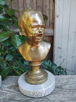 BUSTE D'ENFANT. BRONZE DORÉ SUR MARBRE. FRANCE. 19ème/20ème