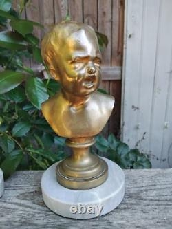 BUSTE D'ENFANT. BRONZE DORÉ SUR MARBRE. FRANCE. 19ème/20ème