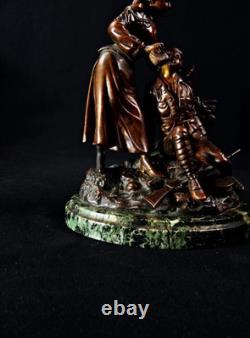 Georges Omerth sculpture en bronze sur marbre infirmière soignant un soldat