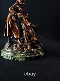 Georges Omerth sculpture en bronze sur marbre infirmière soignant un soldat