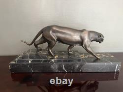 H. Molins Sculpture panthère en bronze signée sur socle marbre noir veiné