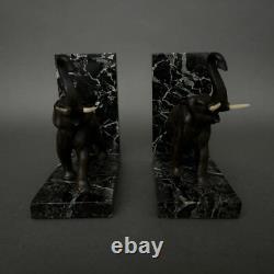 Paire de serre-livres éléphants en bronze signés Carvin bases en marbre M3300