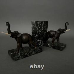 Paire de serre-livres éléphants en bronze signés Carvin bases en marbre M3300
