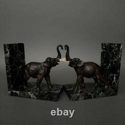 Paire de serre-livres éléphants en bronze signés Carvin bases en marbre M3300