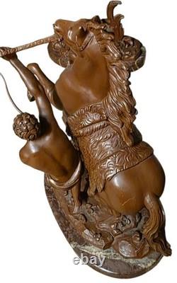 Paire les chevaux de marly en bronze et marbre turquin