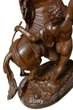 Paire les chevaux de marly en bronze et marbre turquin