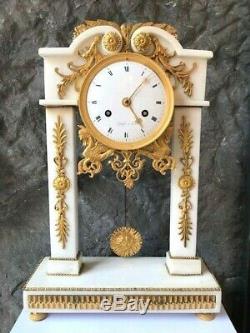 Pendule portique époque EMPIRE signé LAGUEFSE à PARIS marbre blanc bronze doré