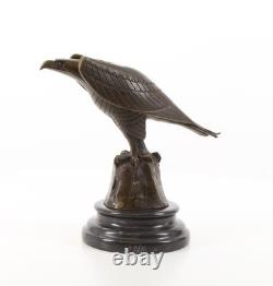 Sculpture Aigle en bronze sur un socle en marbre noir d'après Coenraad