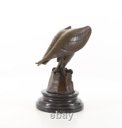 Sculpture Aigle en bronze sur un socle en marbre noir d'après Coenraad