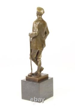 Sculpture Golfeur en bronze sur socle en marbre noir d'après Cesaro