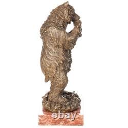 Sculpture Ours avec grippe en bronze sur un socle en marbre rouge d'après Milo