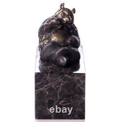 Sculpture Ours panda en bronze sur un marbre noir d'aorès Milo