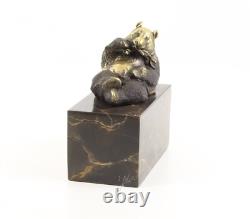 Sculpture Ours panda en bronze sur un marbre noir d'aorès Milo