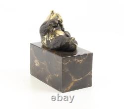 Sculpture Ours panda en bronze sur un marbre noir d'aorès Milo