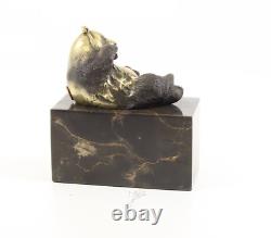 Sculpture Ours panda en bronze sur un marbre noir d'aorès Milo