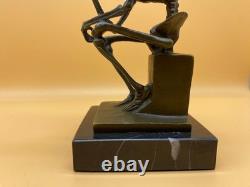 Sculpture Penseur squelette en bronze sur socle en marbre noir D'aprés Milo