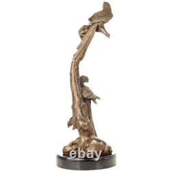 Sculpture Perroquets en bronze sur un socle en marbre noir d'après Milo