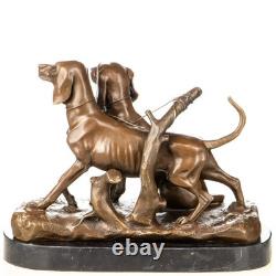 Sculpture chiens de chasse en bronze sur un socle en marbre noir d'après A. Cain