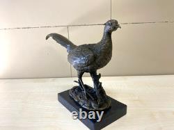 Sculpture d'un Faisan en bronze sur un socle en marbre noir Signée