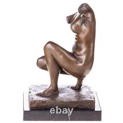 Sculpture d'un torse femme en bronze sur un socle en marbre d'après Milo