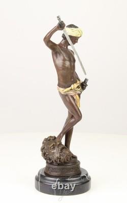 Sculpture de David en bronze sur un socle en marbre noir d'après Antonin Mercier