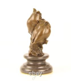 Sculpture de deux hibou en bronze sur un socle en marbre d'après L. Bistolfi