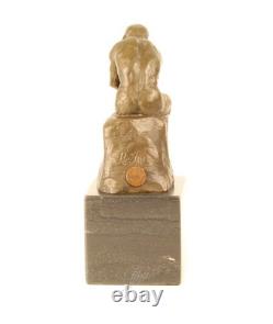 Sculpture en bronze Le Penseur sur un marbre noir d'après Auguste Rodin