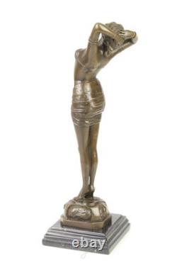 Sculpture en bronze Nomme Reveil Art déco sur un marbre noir d'après Philips