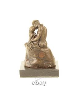 Sculpture en bronze impressionniste Le Baiser sur un marbre noir d'après Rodin