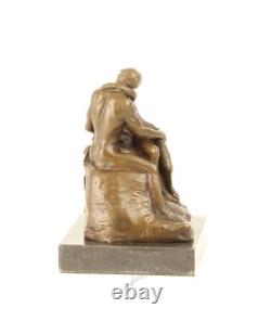 Sculpture en bronze impressionniste Le Baiser sur un marbre noir d'après Rodin