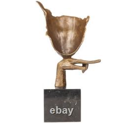 Sculpture en bronze moderne avec visage abstrait sur un marbre noir signée