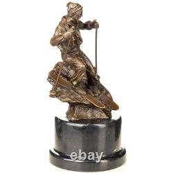 Scupture d'un skieur en bronze sur un socle en marbre noir d'après Nick