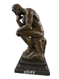 Statue en bronze Le Penseur sur un socle en marbre noir d'après Rodin