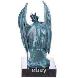 Statue en bronze d'un diable à patine verte sur un socle en marbre d'après Milo